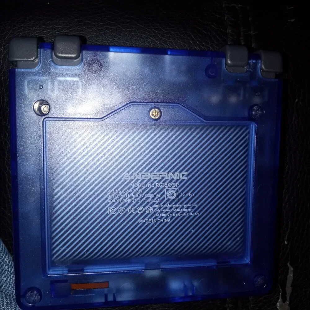 Pre-Loaded Anbernic RG35XXSP blue transparent with most retro platforms 64gb